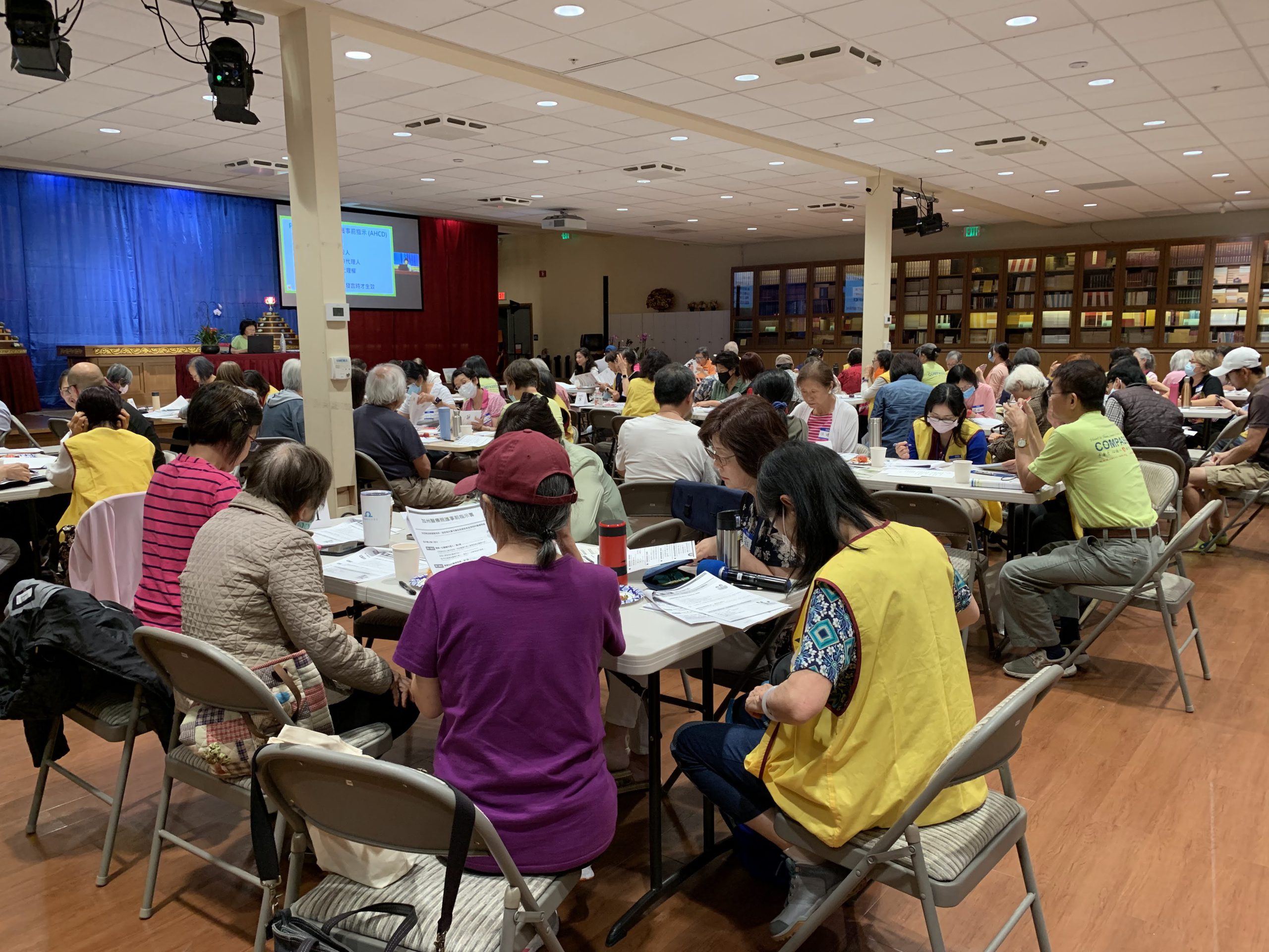 Participants discussing in groups at event