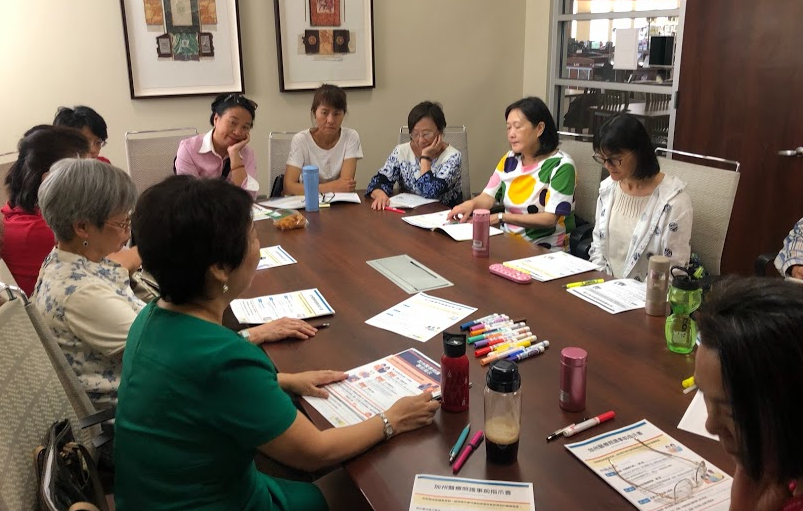 volunteers sitting around table