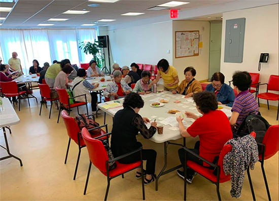 Participants playing Heart-to-Heart around table