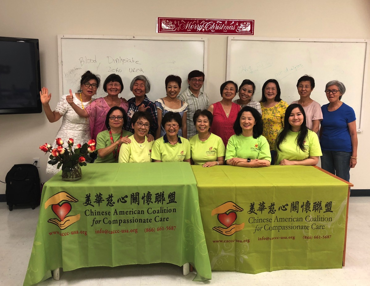 group photo behind CACCC table