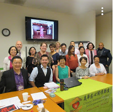 group photo behind CACCC table