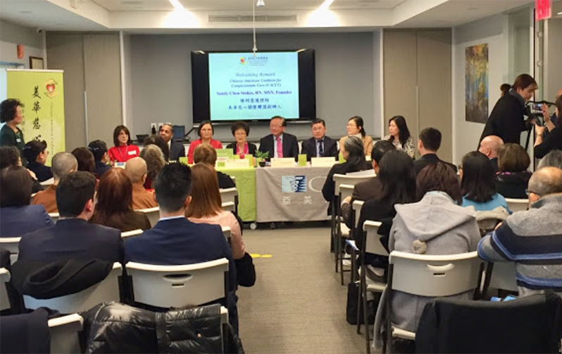 Panelists speaking to audience