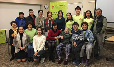 group photo in front of CACCC banner