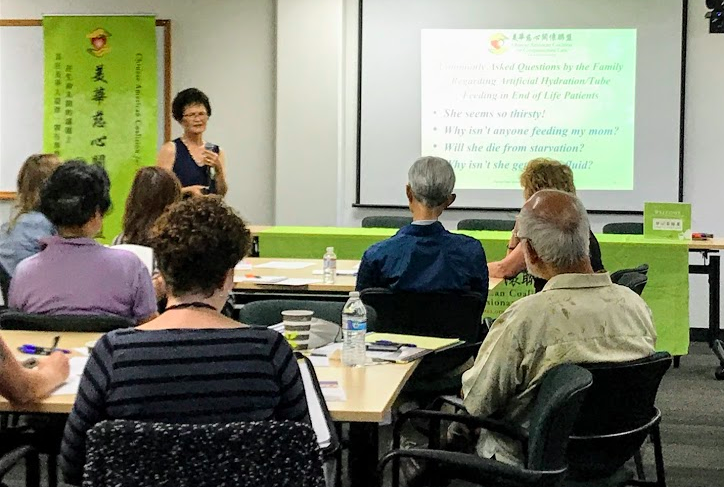 Sandy Stokes lecturing to an audience