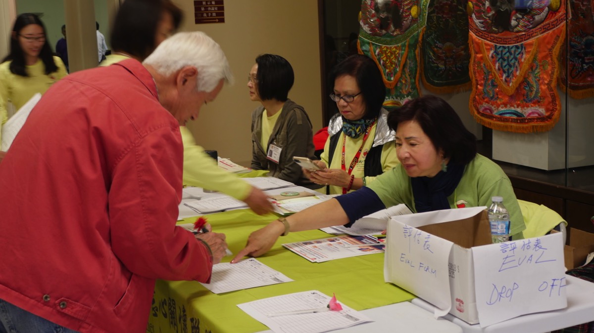 Volunteers at CACCC table at event