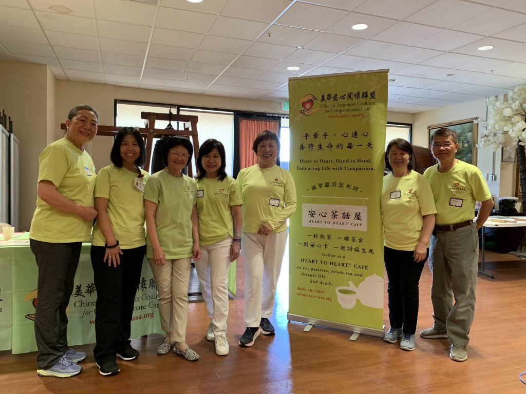 CACCC staff and volunteers standing together at event