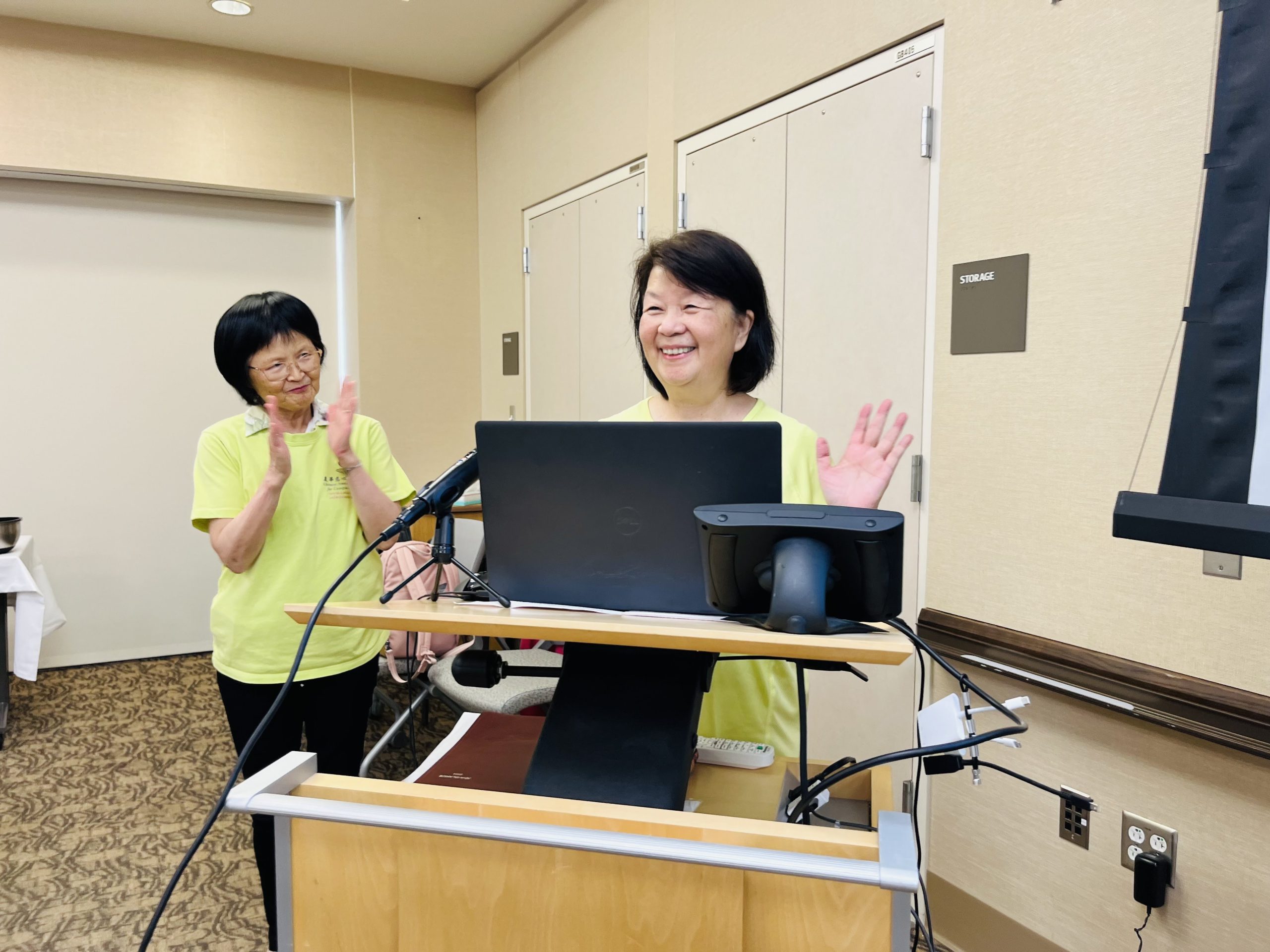 CACCC founder and office supervisor welcoming audience at event