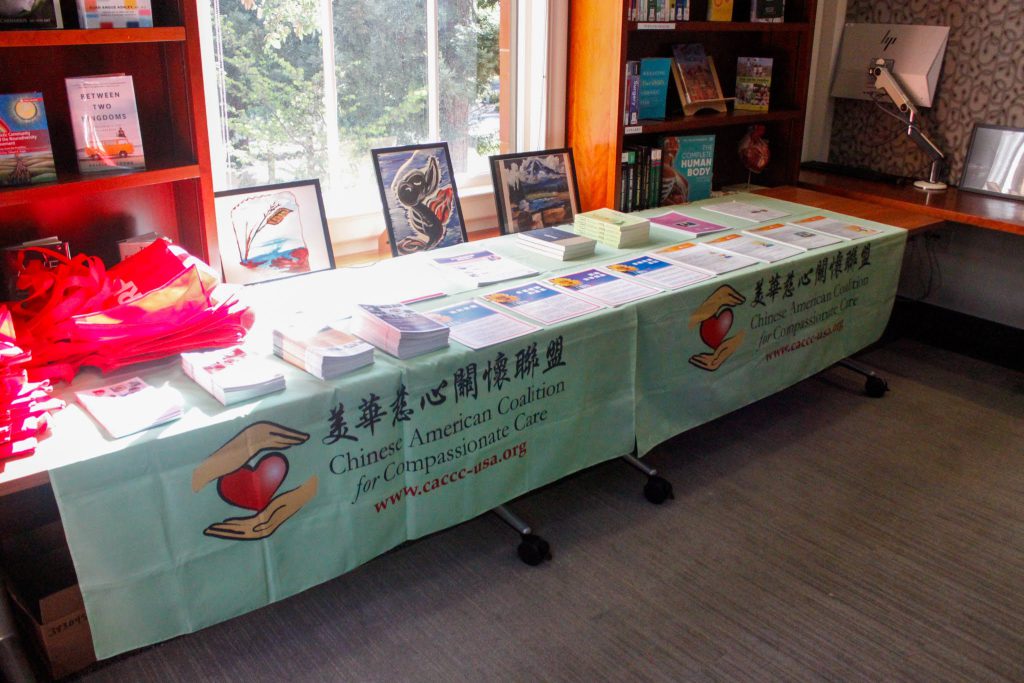 Table of CACCC materials at an event