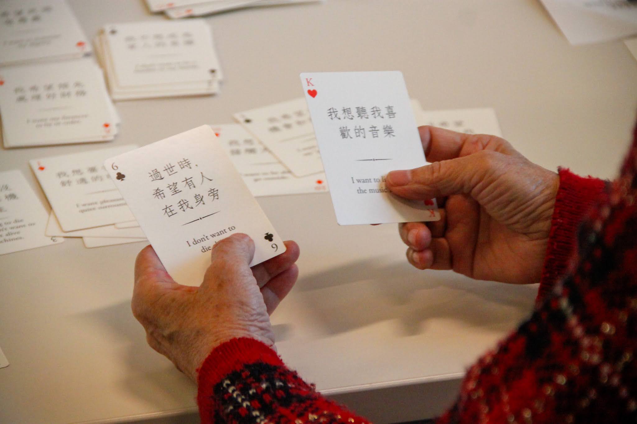 Closeup of participant choosing from different Heart to Heart Cards