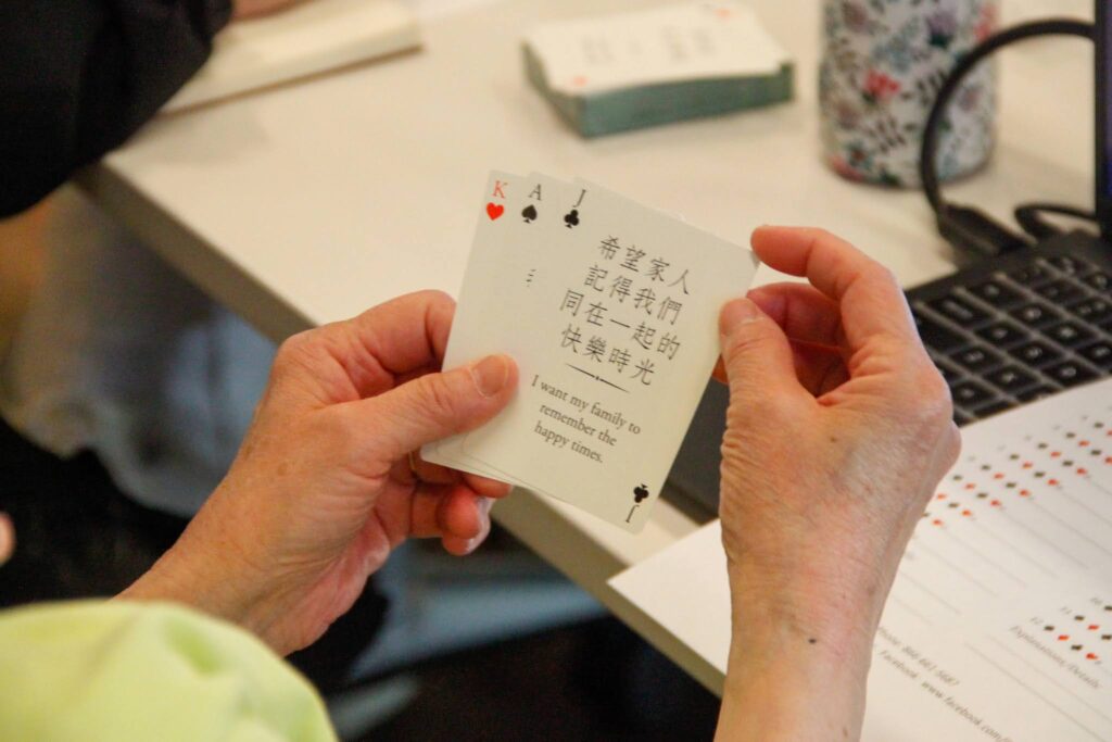 hand holding heart to heart cards