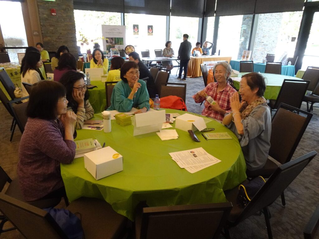 attendees chatting happily at event