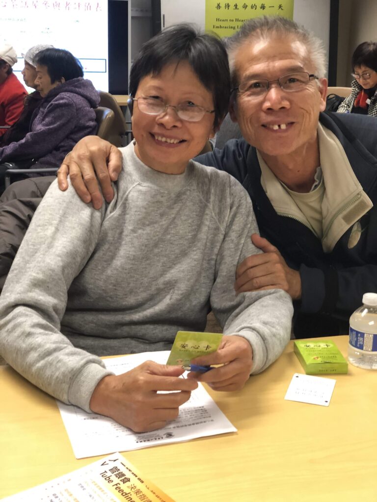 smiling pair of attendees