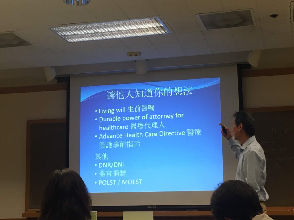 CACCC member lecturing with slides
